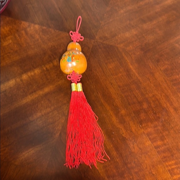 Orange and Red Decorative Gourd with Tassel Home
Car Decor - Picture 6 of 6